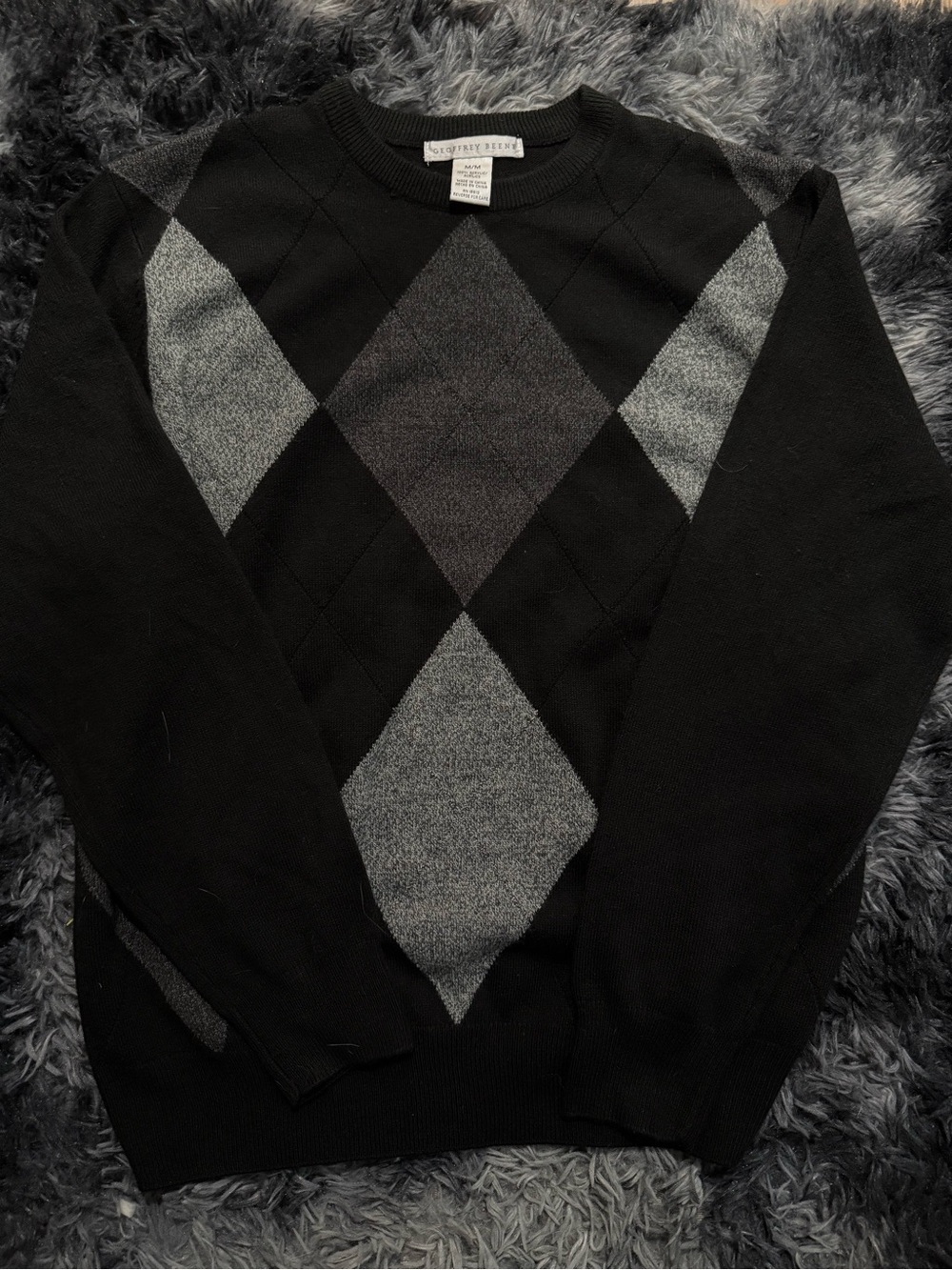 Black and grey argyle knit crewneck sweater by Geoffrey Beene M